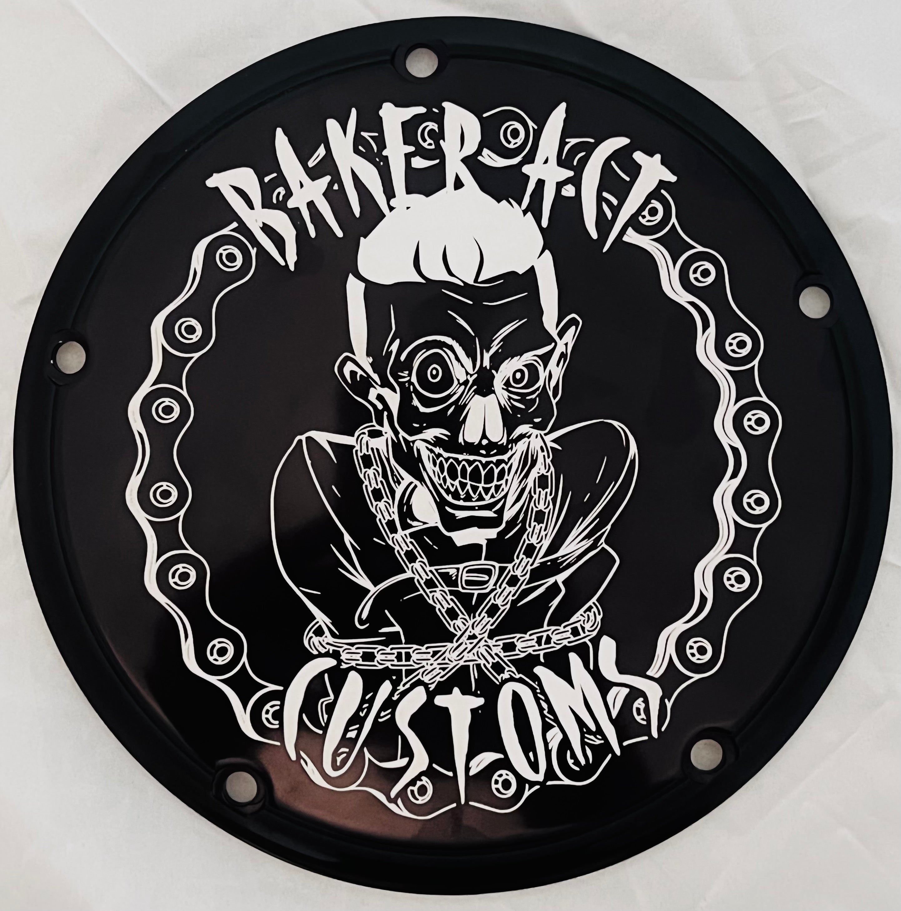 Baker Act Logo Derby Cover Gloss Black  (HD Touring 2016 and up)